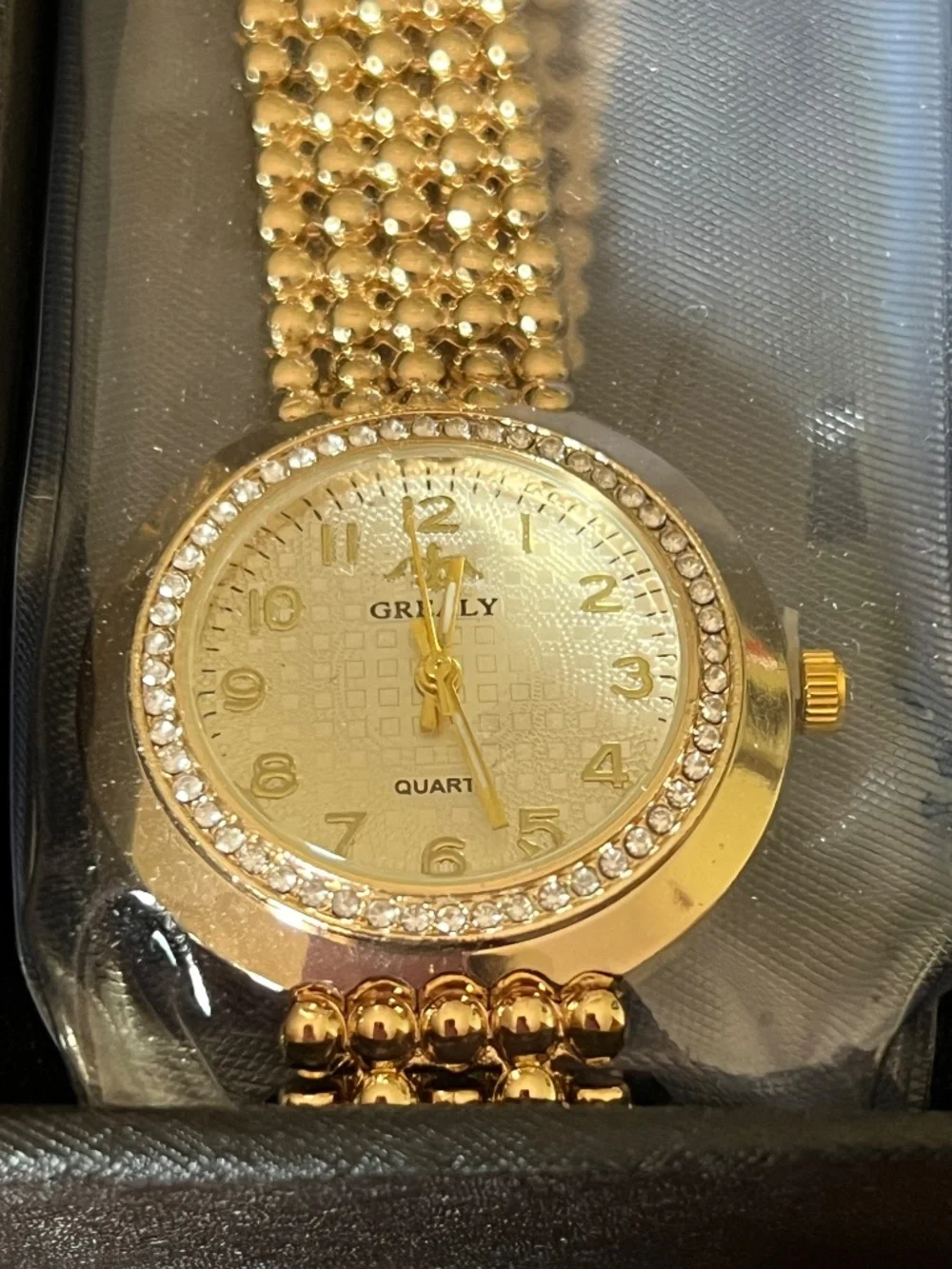 New Grealy ladies gold toned watch